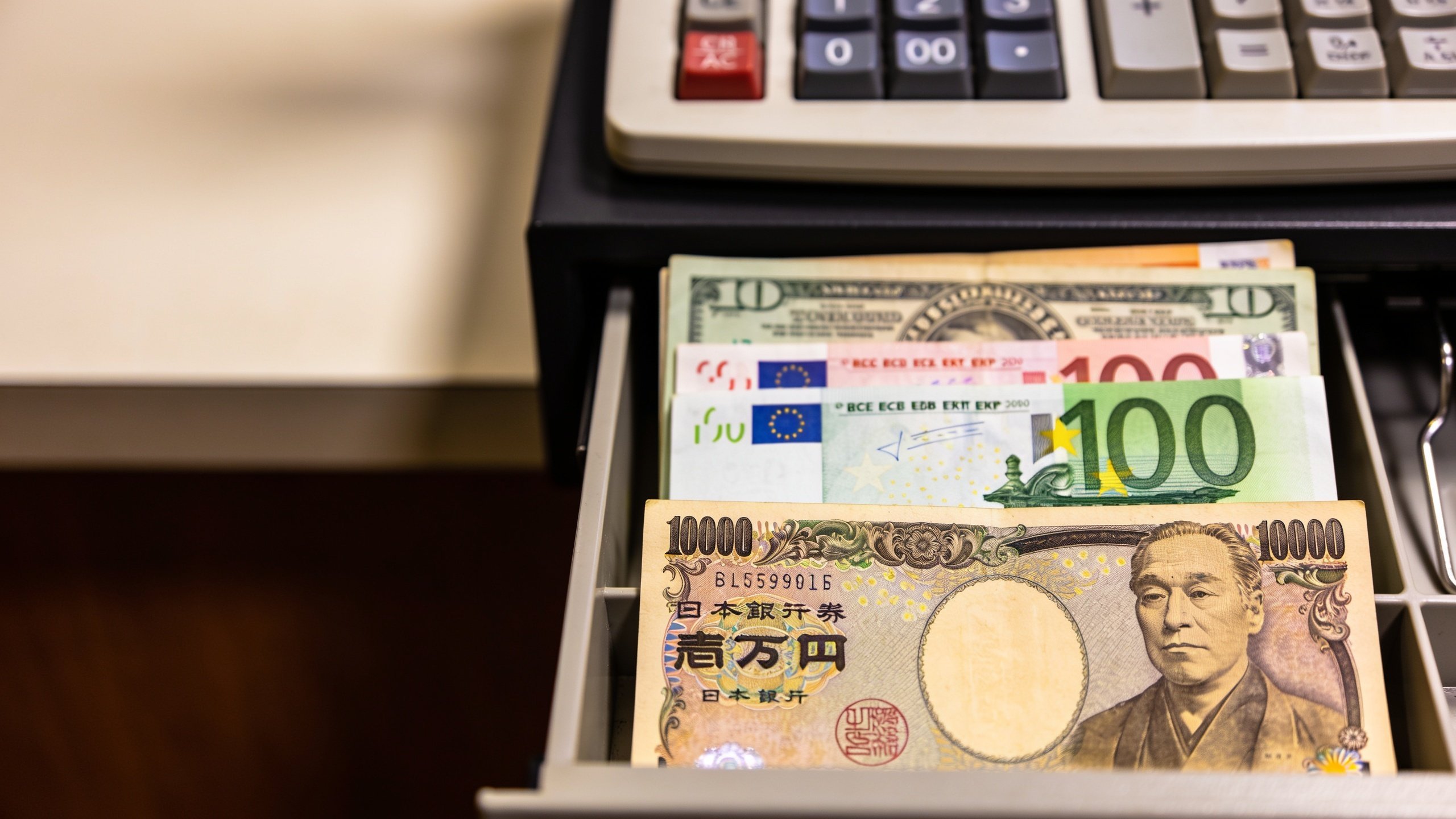 USD/JPY Price Forecast: Tests nine-day EMA support after falling below 157.50