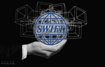 SWIFT、ブロックチェーンベースの国際送金にXRPとHBARを活用