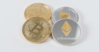 Bitcoin slides, Ether, XRP, Dogecoin move lower ahead of Fed Chair’s final Jackson Hole speech