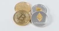 Bitcoin slides, Ether, XRP, Dogecoin move lower ahead of Fed Chair’s final Jackson Hole speech