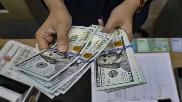 Ditekan Suku Bunga The Fed, Rupiah Anjlok ke 18.027 per Dolar AS image 1