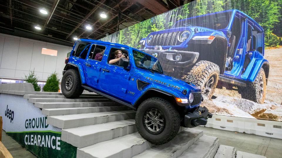 Jeep manufacturer Stellantis reveals a major overhaul of its operations along with significant financial write-downs. Stock prices plummet.