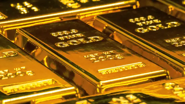 Harga Emas Dunia Merosot Dipicu Isu The Fed dan Perang Timur Tengah image 3